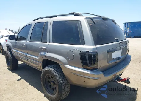 1999 Jeep Grand Cherokee Limited z USA, uszkodzony, nr VIN 1J4GW68N0XC550821